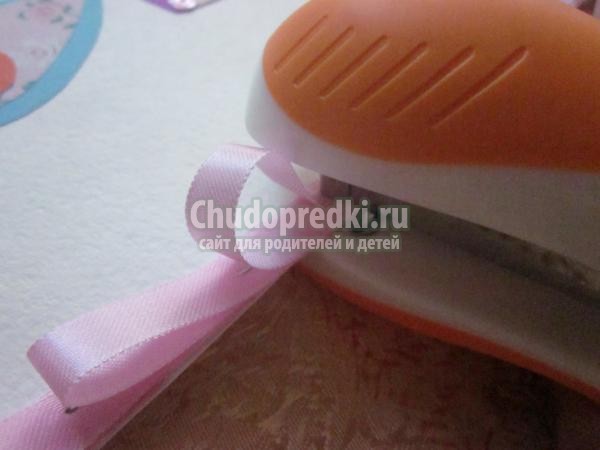 поделка из дисков и цветной бумаги. Павлинчик