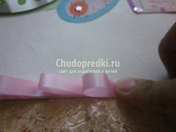 поделка из дисков и цветной бумаги. Павлинчик