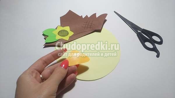 поделка из цветной бумаги Голова пугала